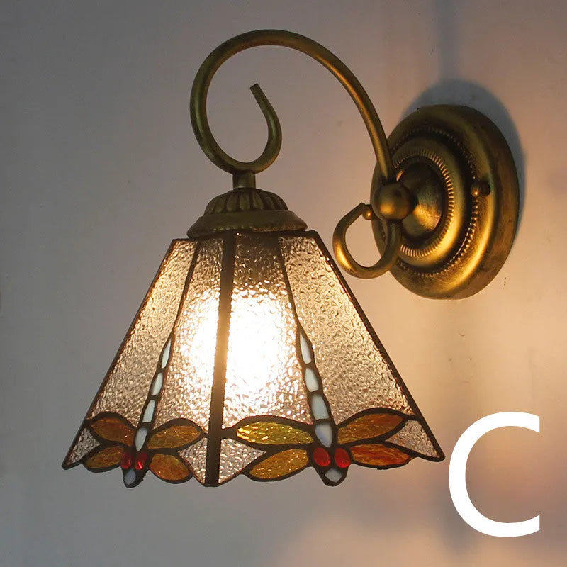 Coloured stained glass wall mounted light fitting for corridors, available in multiple style and colour options.