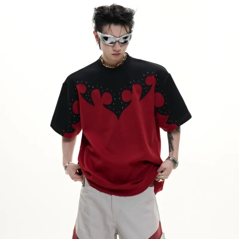 Men's red short sleeve shirt with 3D burnt flower embroidery and rhinestone details on a loose drop shoulder fit.