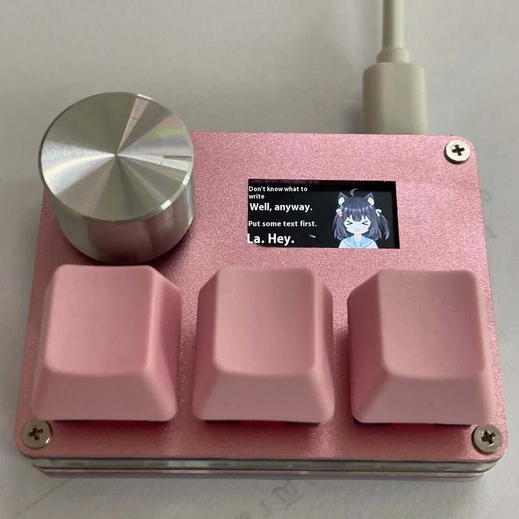 Customisable magnetic axis numeric keyboard with programmable knob and colour screen in black, pink, silver, or white.