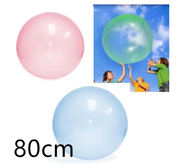 Assortment of inflated pink, yellow, blue and green TPR bouncy balls in different sizes on a plain background.