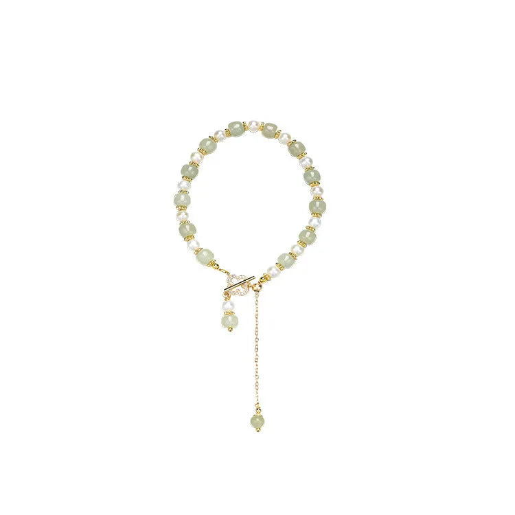 Gold-coloured Hetian jade bracelet with pearl pendant and Chinese style round beads