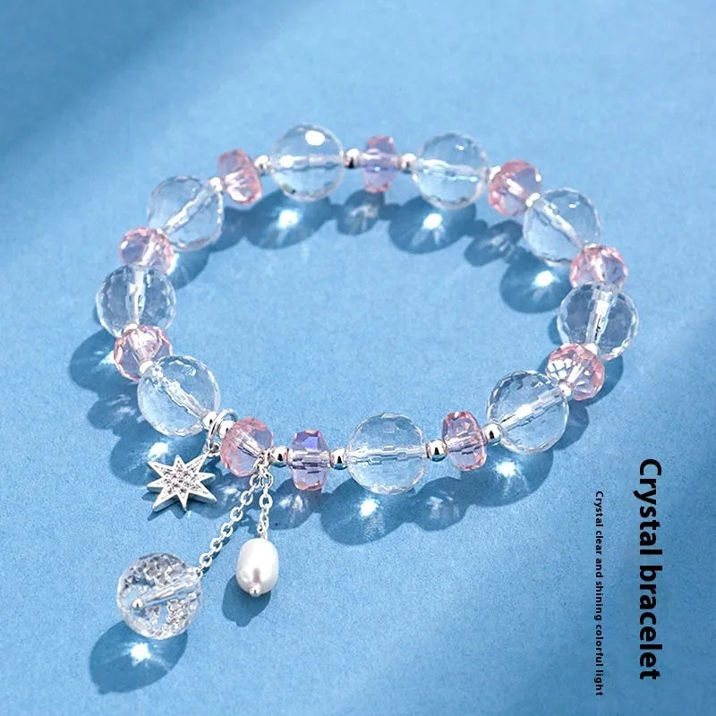 White crystal bracelet with lucky cat charm and diamond-shaped XINGX crystal centrepiece