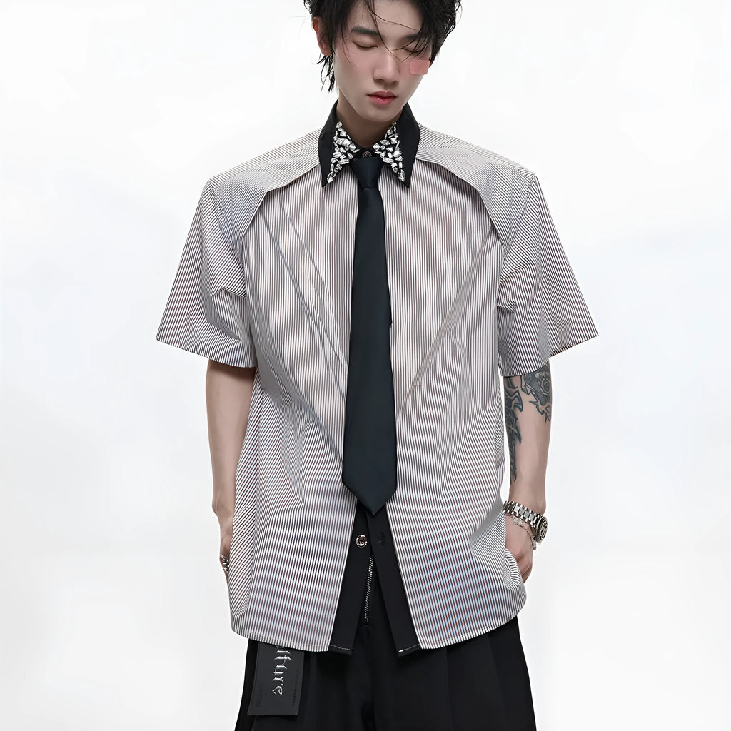 Men's blue and khaki loose fit shirt with diamond tie and patchwork striped pattern.