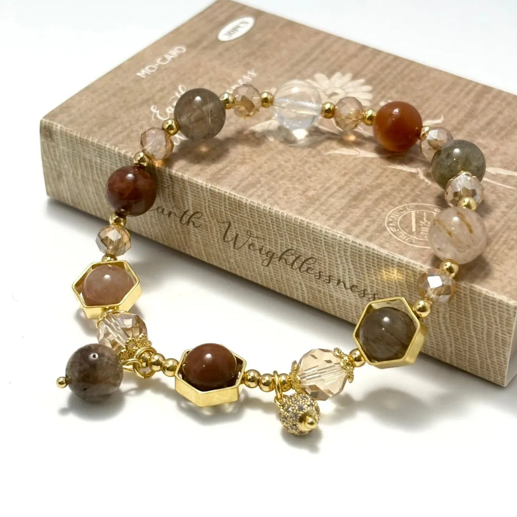 Gold-coloured crystal bracelet with auspicious symbols and 8mm constellation modelling