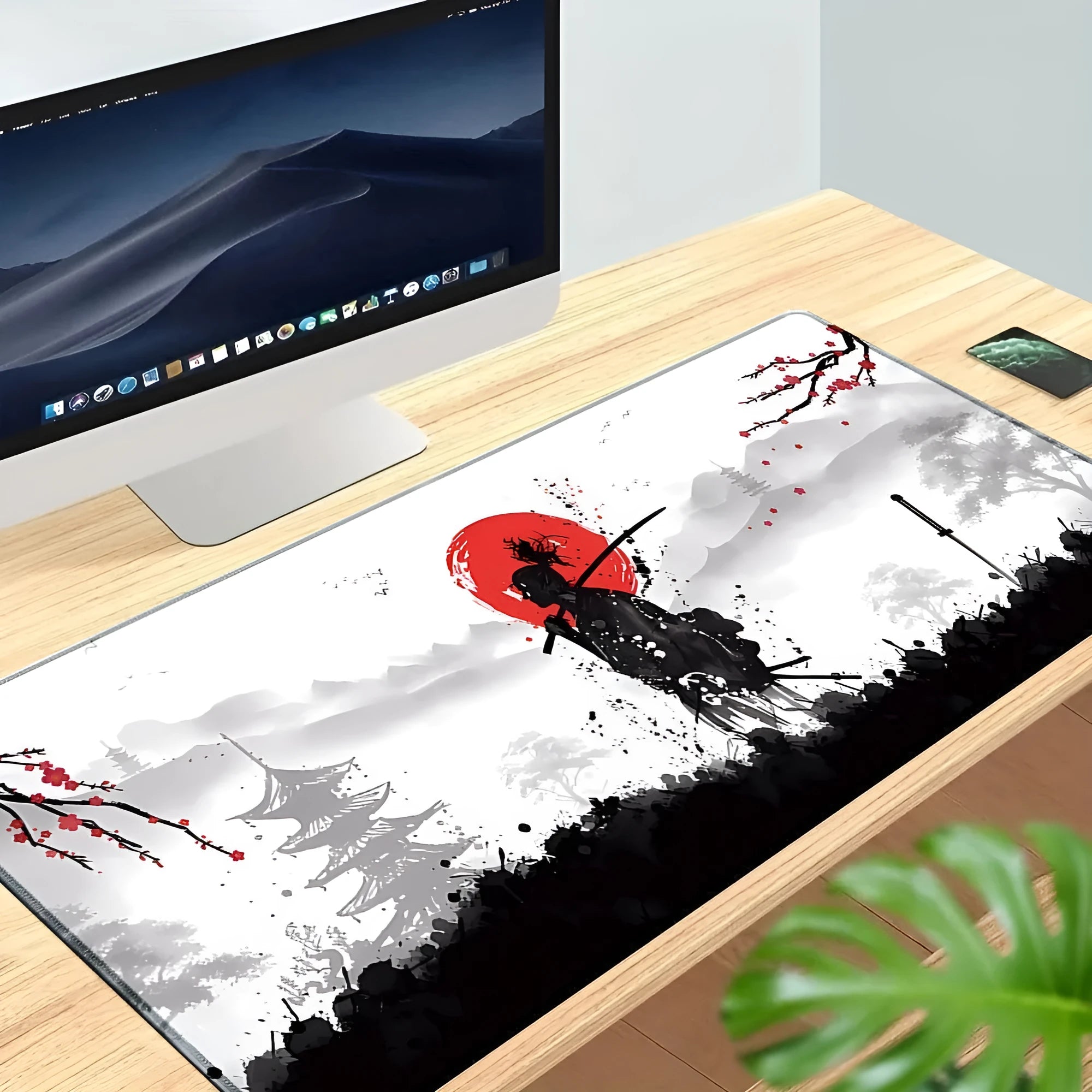 Japanese samurai artwork gaming mouse pad on a desk with a computer mouse