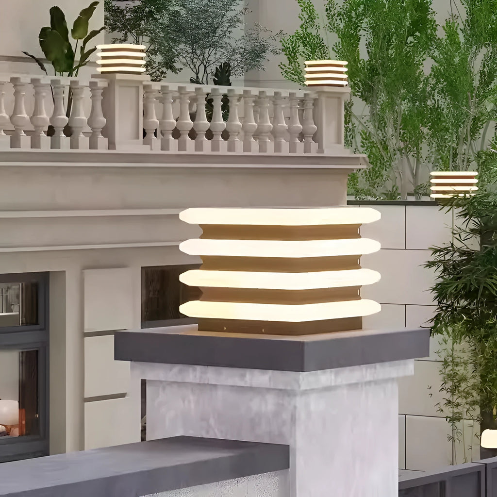 Square stainless steel solar pillar lamp on a garden wall, IP65 waterproof, available in 30cm and 40cm heights