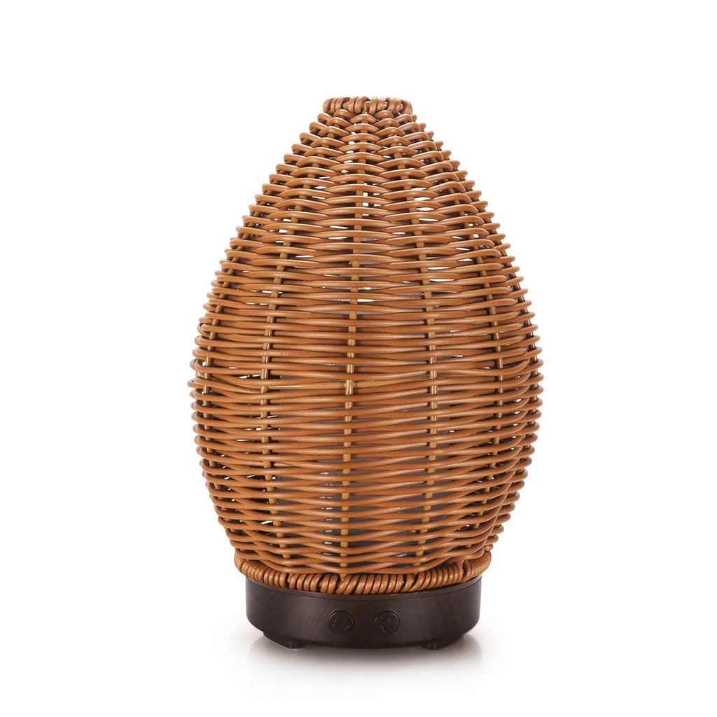 Hollow rattan aroma diffuser with light wood grain base and 100ml capacity for essential oils