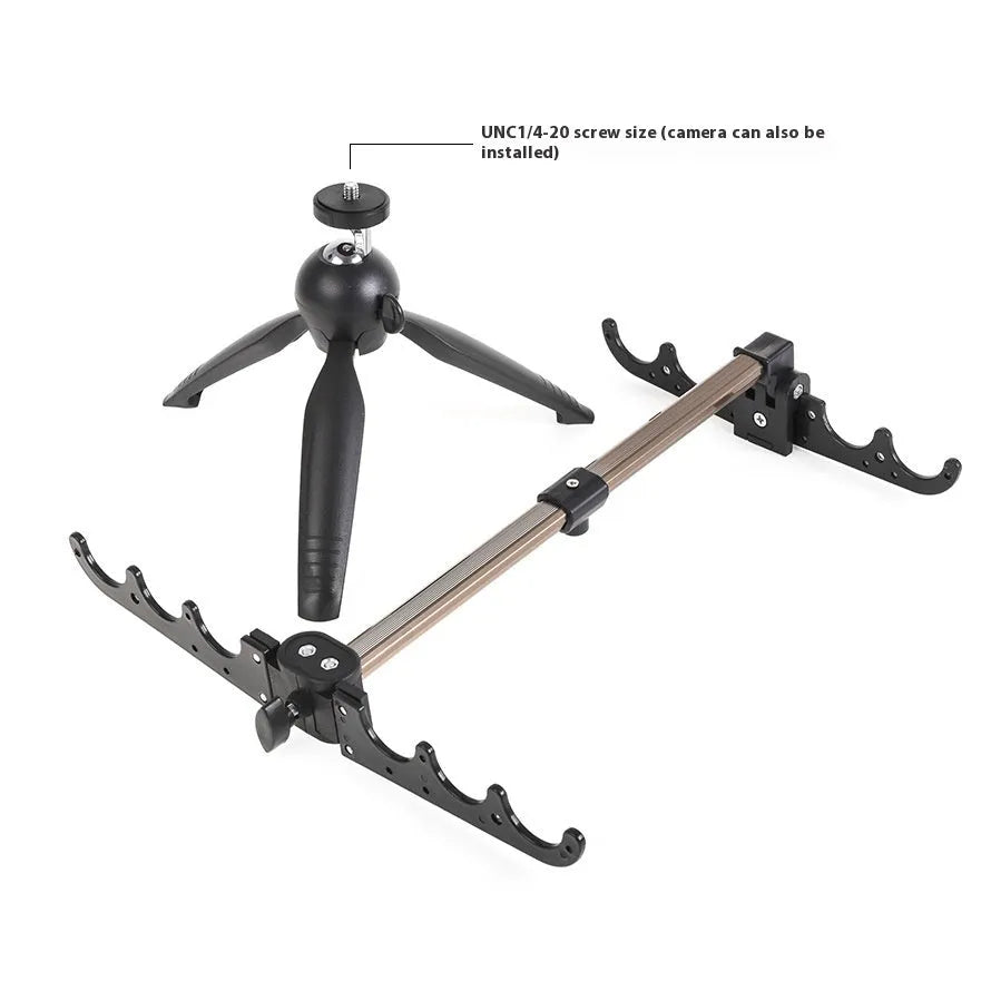 Aluminium ice fishing rod holder bracket with a tripod base on ice.
