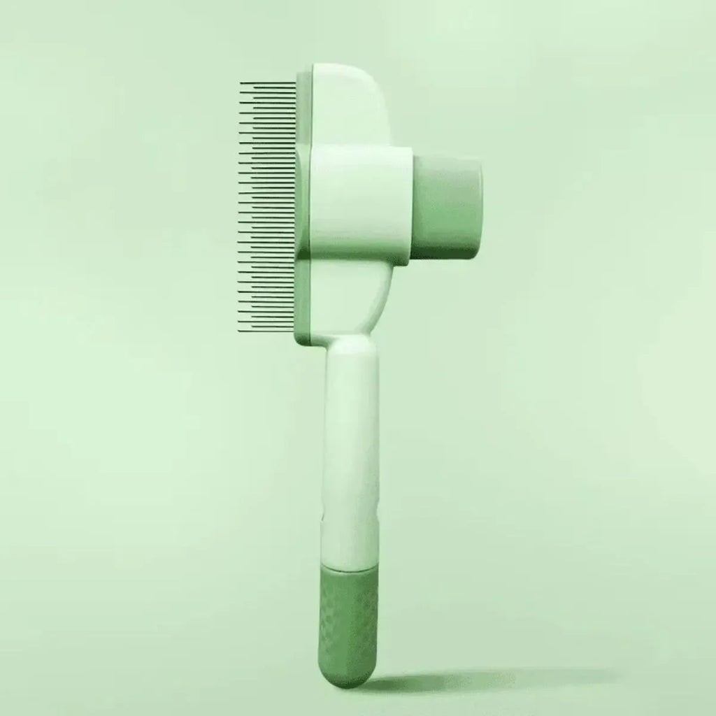 Green and yellow dog grooming brush with silicone bristles and one-click hair removal mechanism