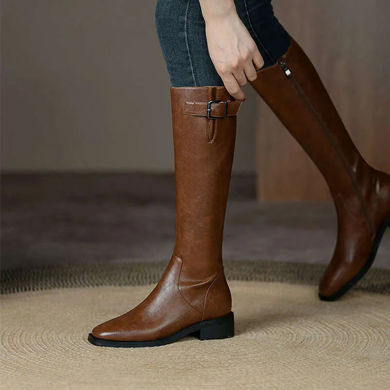 Black or brown knee high boots with low chunky heel and round toe, microfiber upper, sizes 35-40.