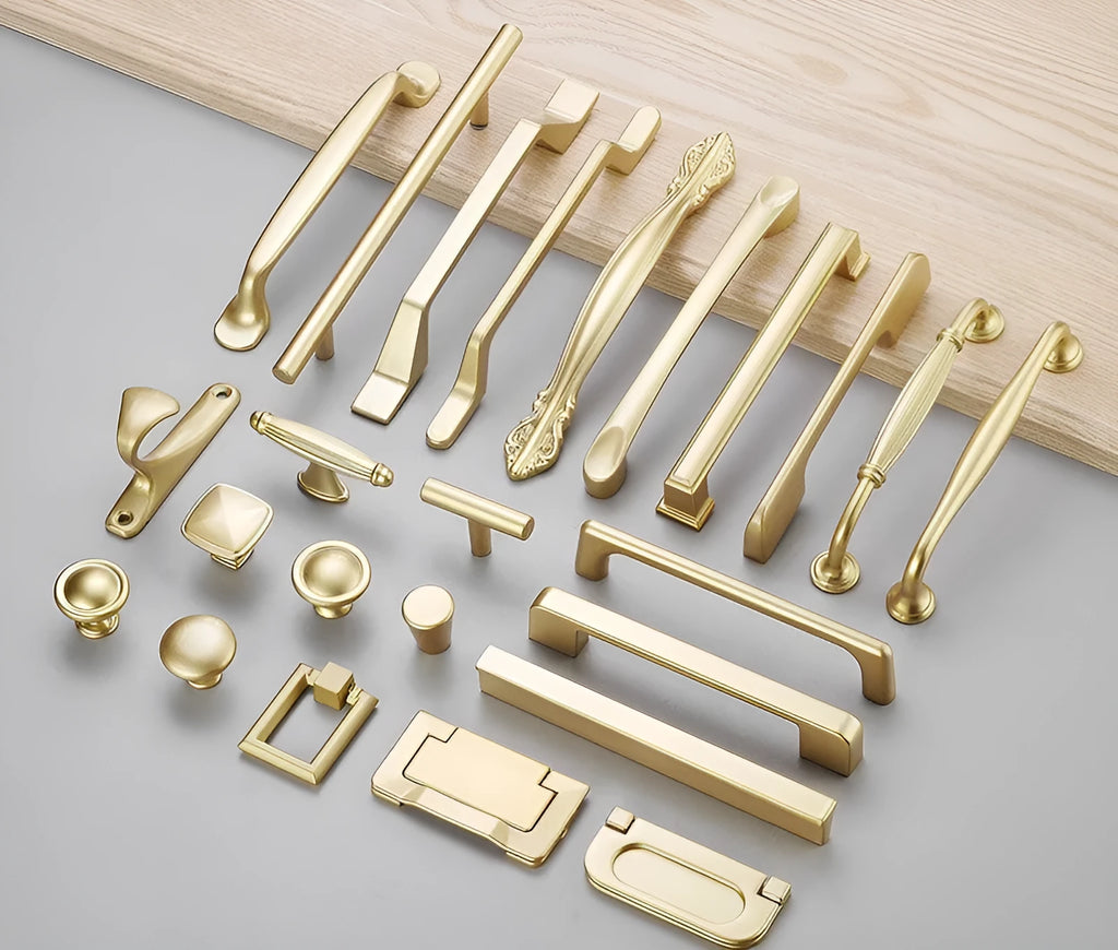 Gold-coloured aluminium alloy single hole cabinet handle with a modern T-shape design.