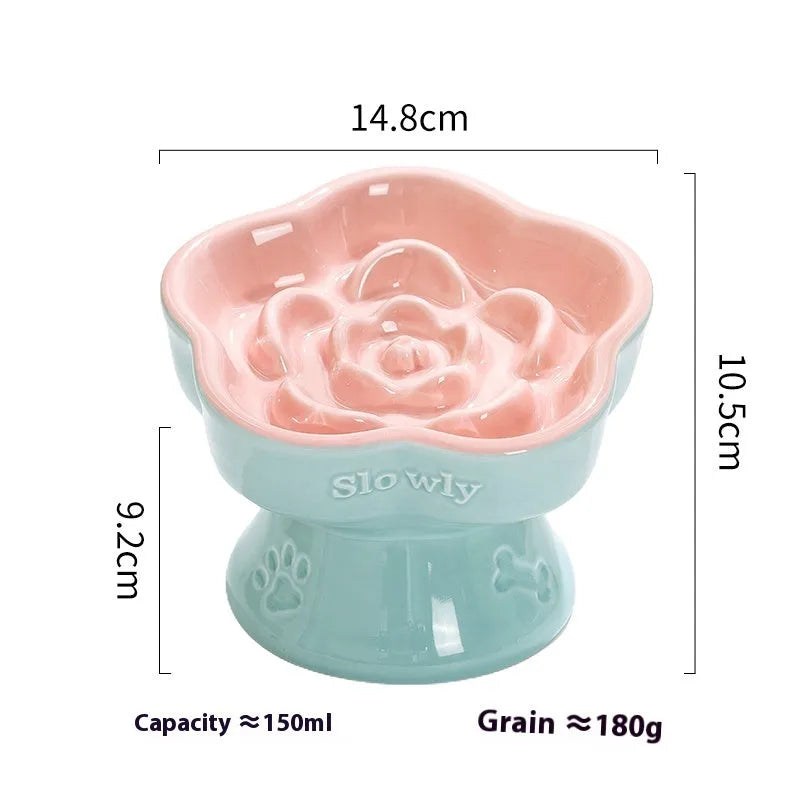 White ceramic pet bowl with a high foot base and wide, shallow eating area for dogs and cats