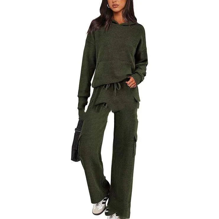 Women's black polyester leisure suit set with long sleeves and full-length trousers on a hanger.