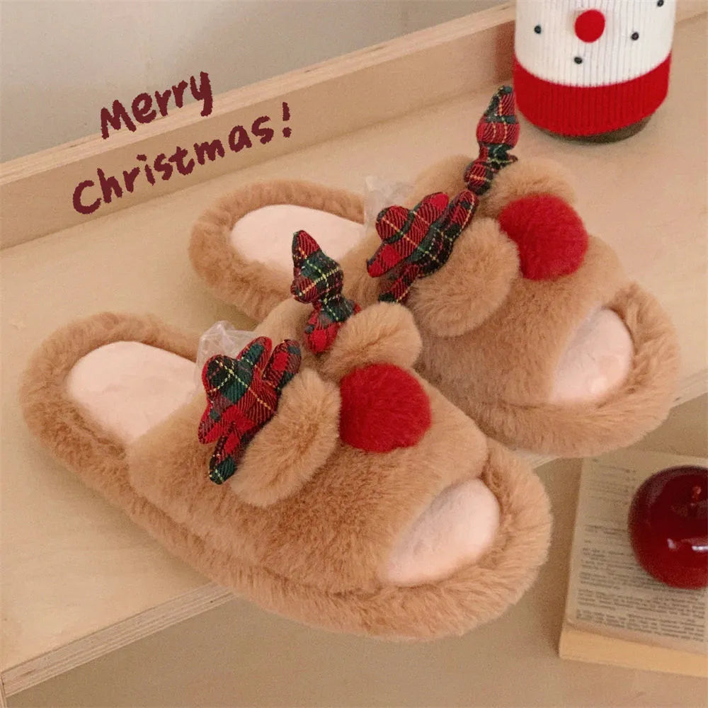 Brown women's slippers with a cartoon deer design, suede upper, and PVC sole.