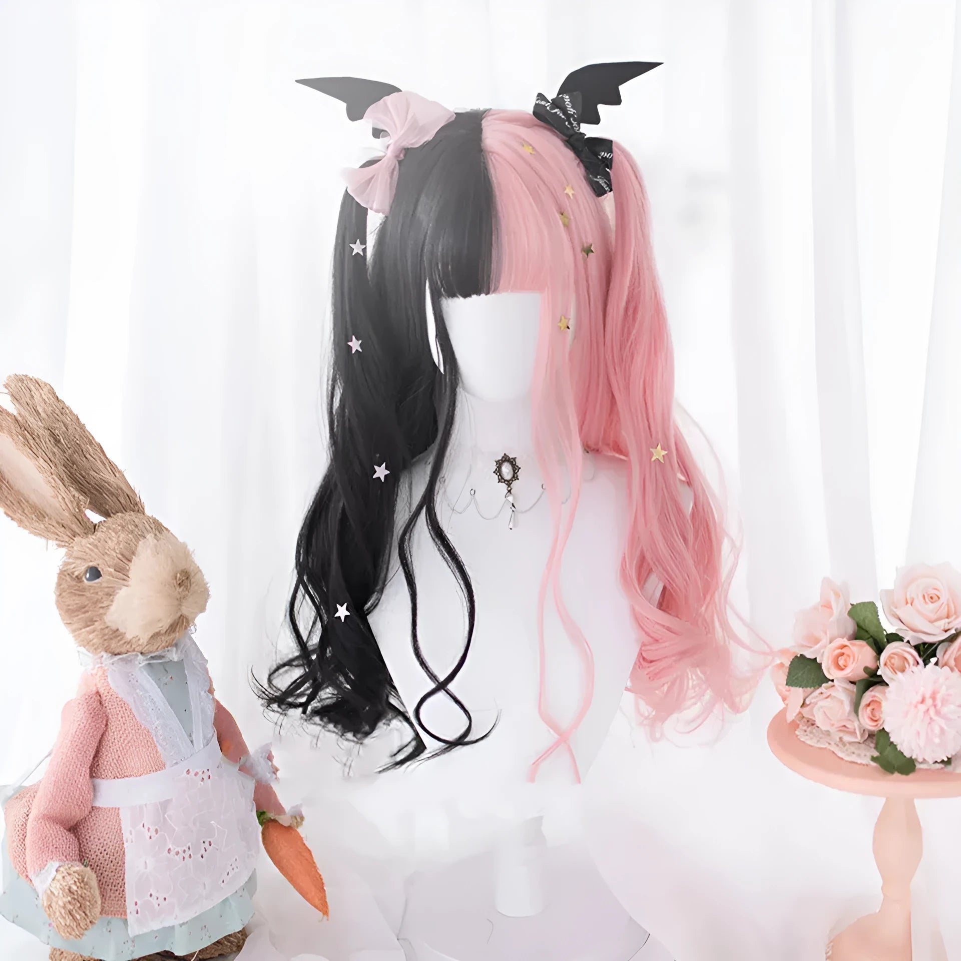 Harajuku Lolita long curly black and pink wig with bangs on a mannequin head