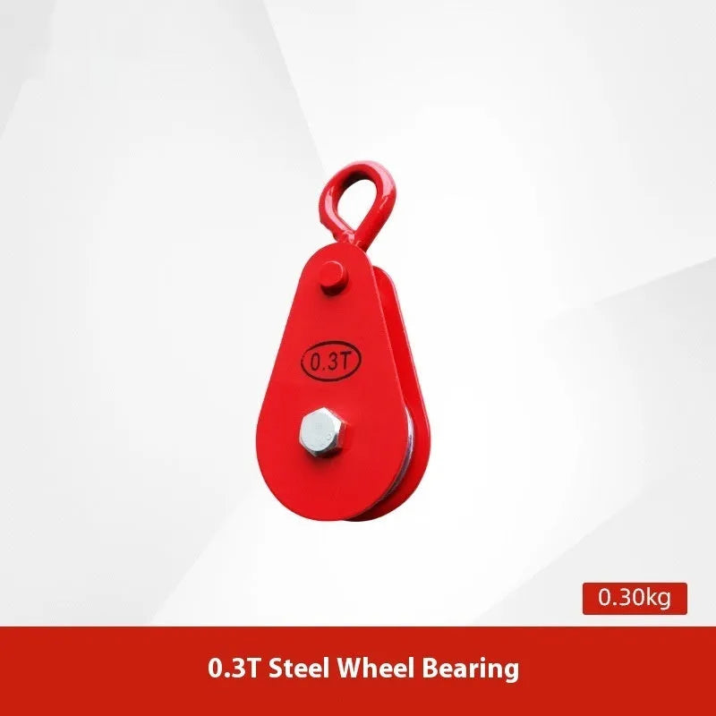 Red industrial steel lifting pulley with a safety latch on the hook for secure lifting.