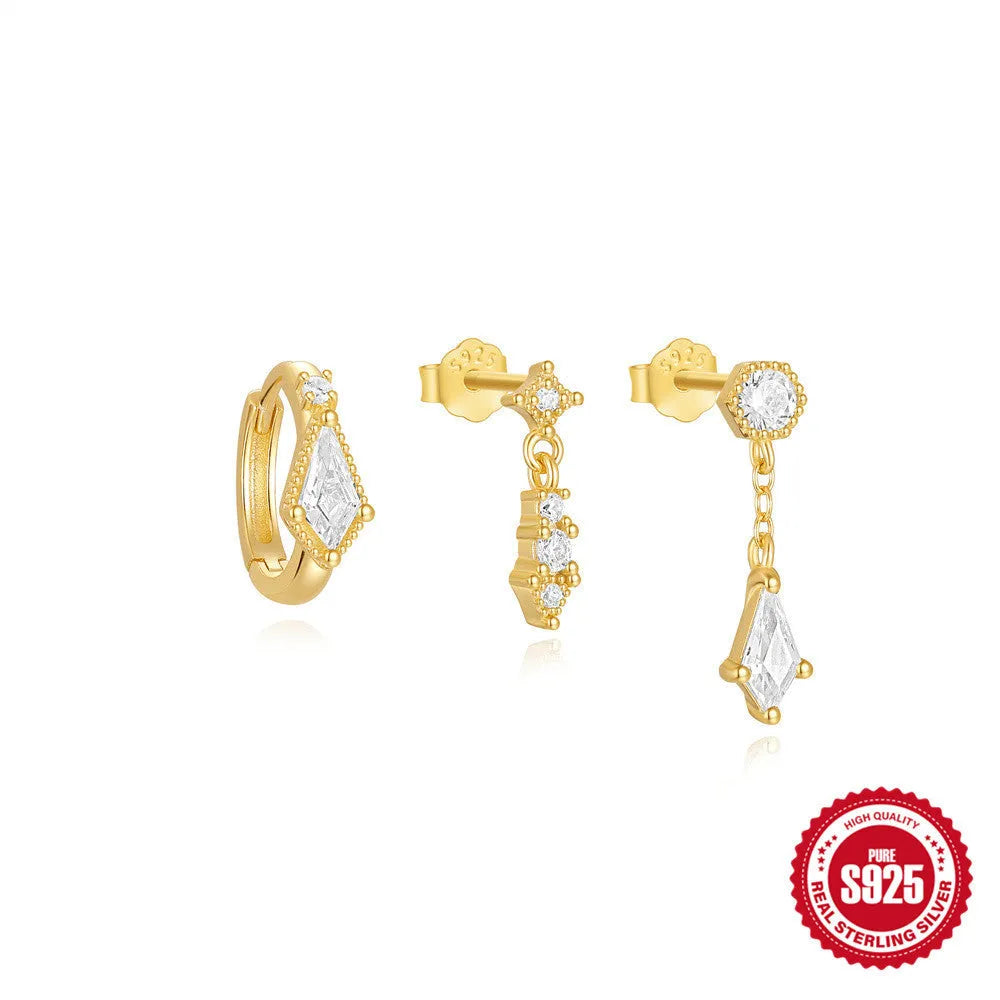 Set of three S925 sterling silver geometric zircon tassel earrings for women on a plain background.