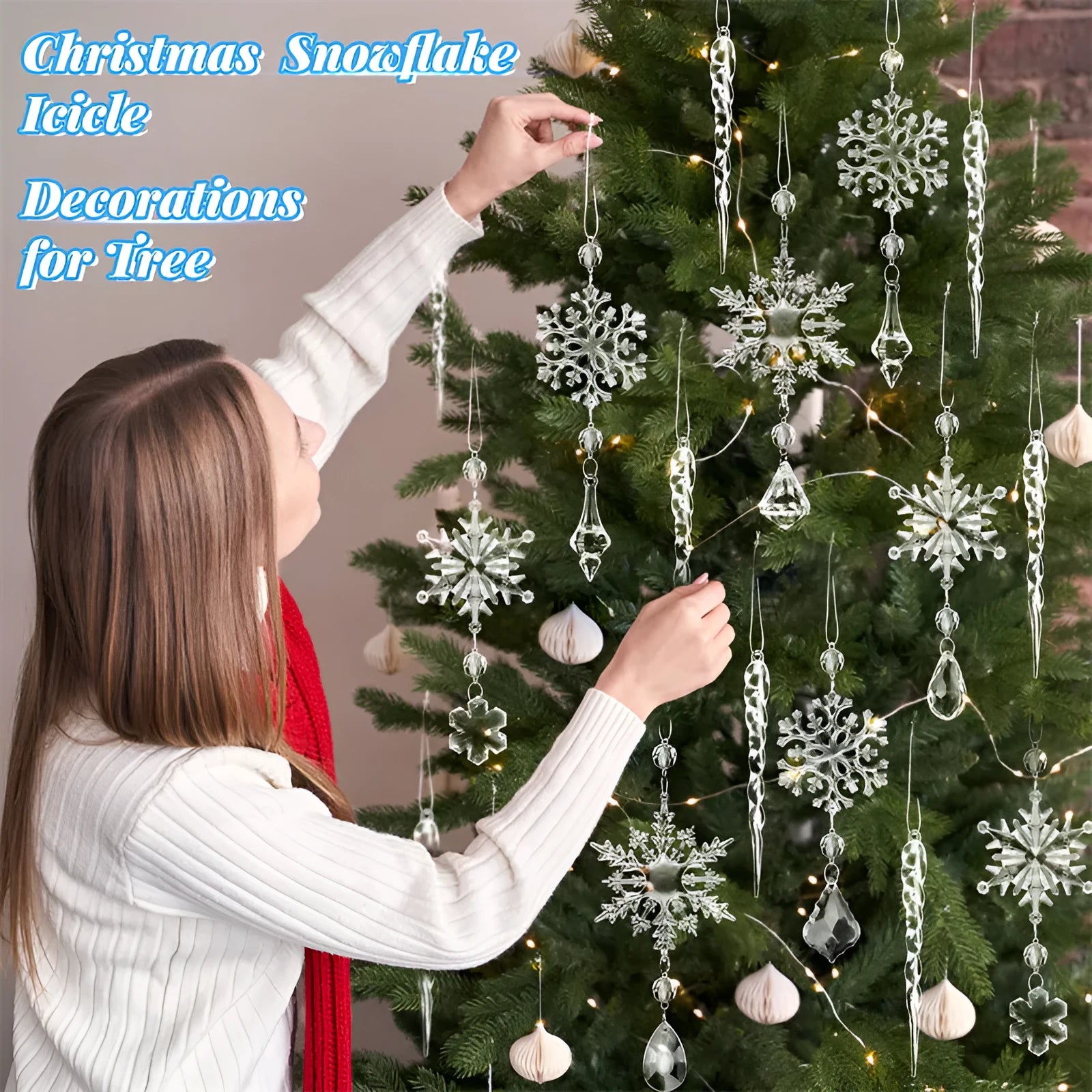 Ten clear acrylic icicle-shaped Christmas ornaments with white ribbons for hanging.