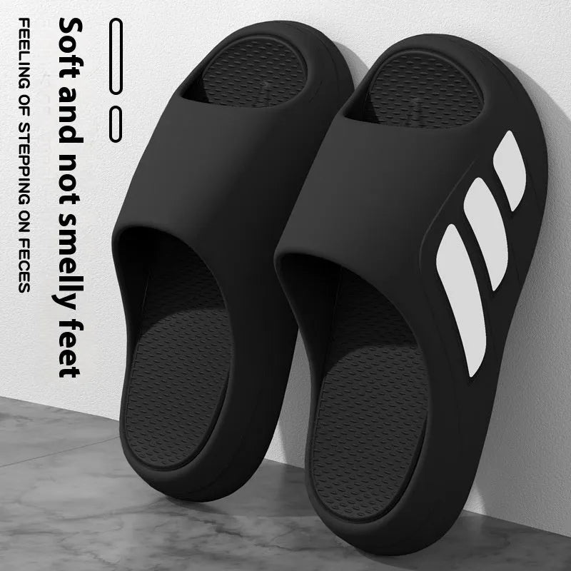 EVA platform slippers in brown, black, red and black, or white and black colours with letter design elements