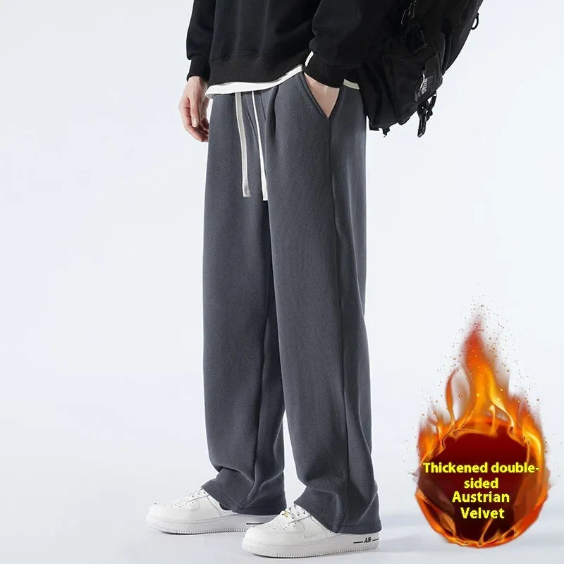 Men's apricot coloured loose-fit polar fleece winter sports pants with a drawstring waist.