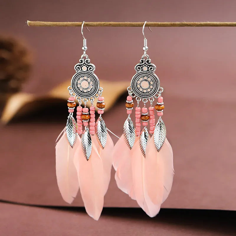 Bohemian style round drop feather earrings with leaf design in alloy, showing electroplated finish.