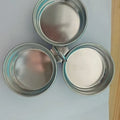 Mini heart-shaped stainless steel egg steamer for cooking a single egg.