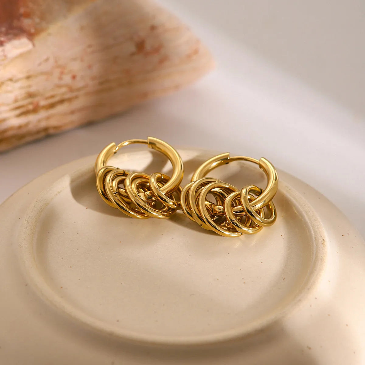 A pair of ins style stainless steel earrings with an electroplated silver-coloured finish.