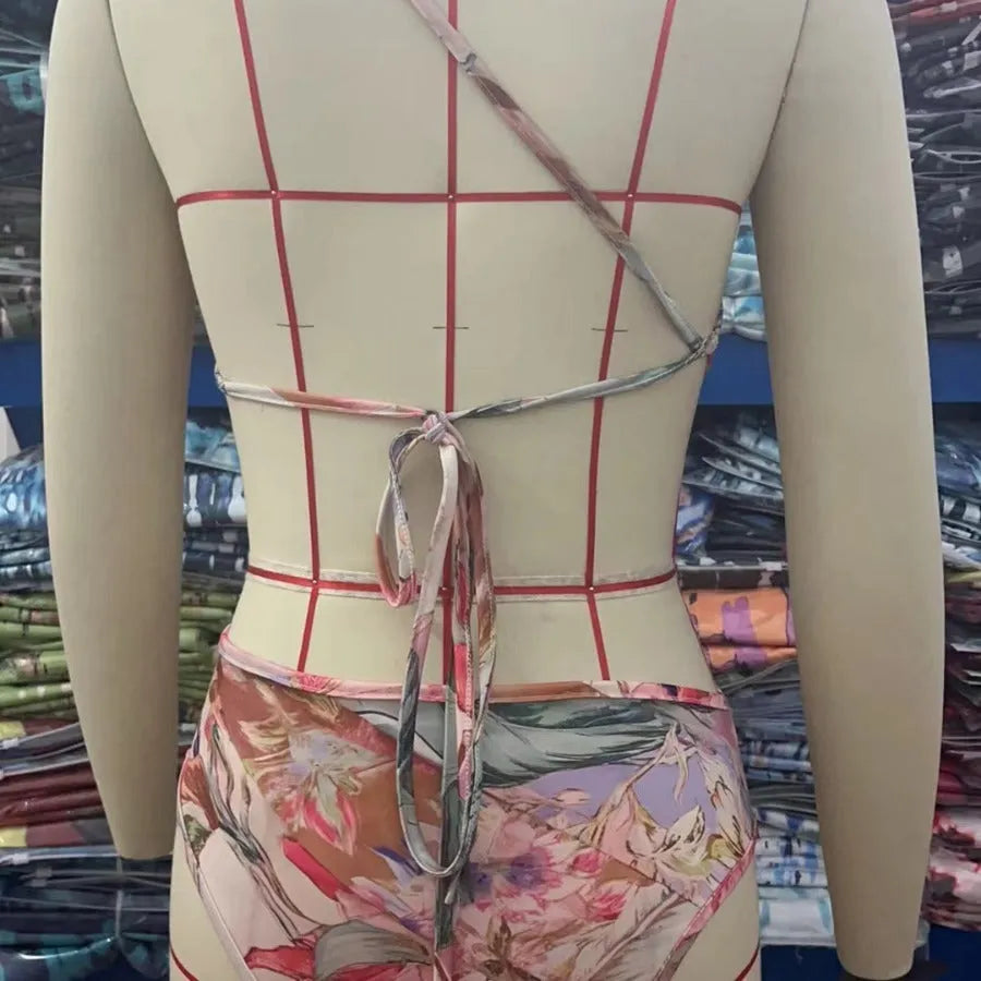 Rose gold patterned women's swimsuit in polyester fabric on mannequin