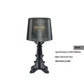 Nordic acrylic desk lamp 240 x 480mm in small black finish on a bedside table