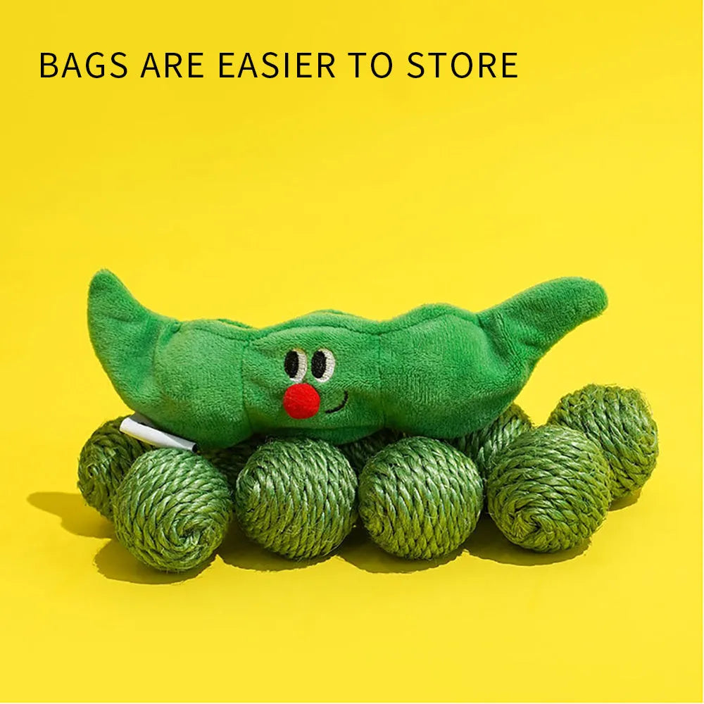 Three green sisal rope cat toy balls with rustling soundstone next to pea pod storage bag