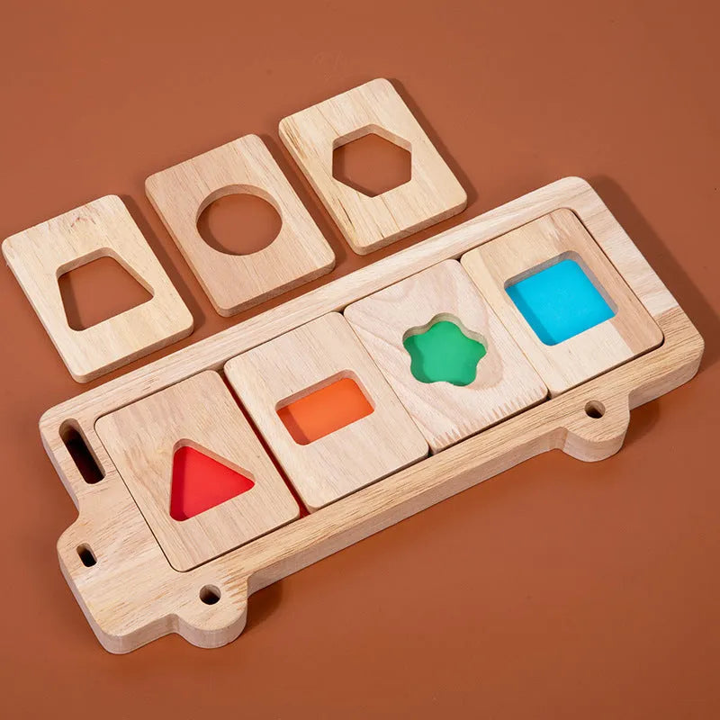 Wooden early education geometry puzzle with colour shape matching, trolley design, on a white background