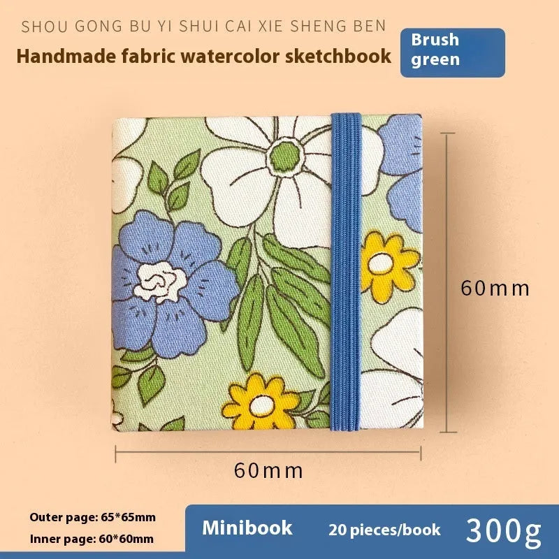 Feiluniao handmade fabric watercolour sketchbook with decorative cover, 185mm long.