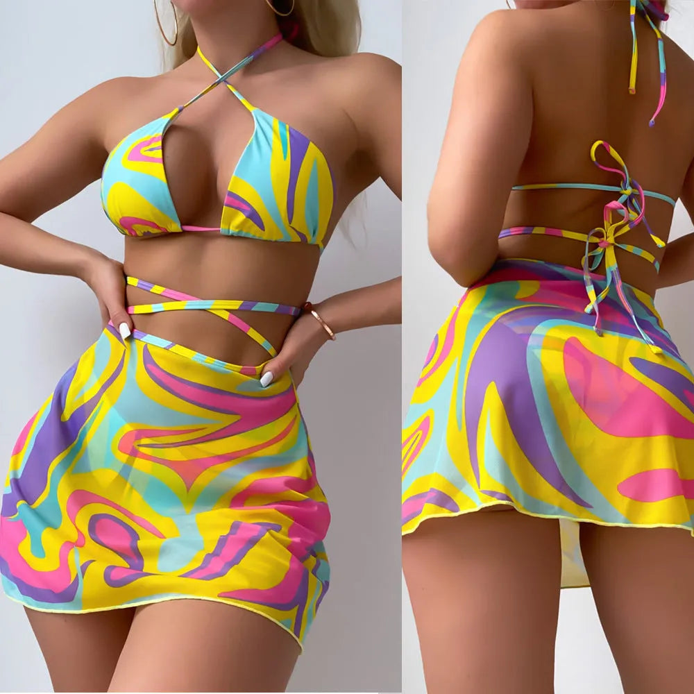 Yellow striped halter-neck swimsuit set for women with lace-up back, skirt, and shorts