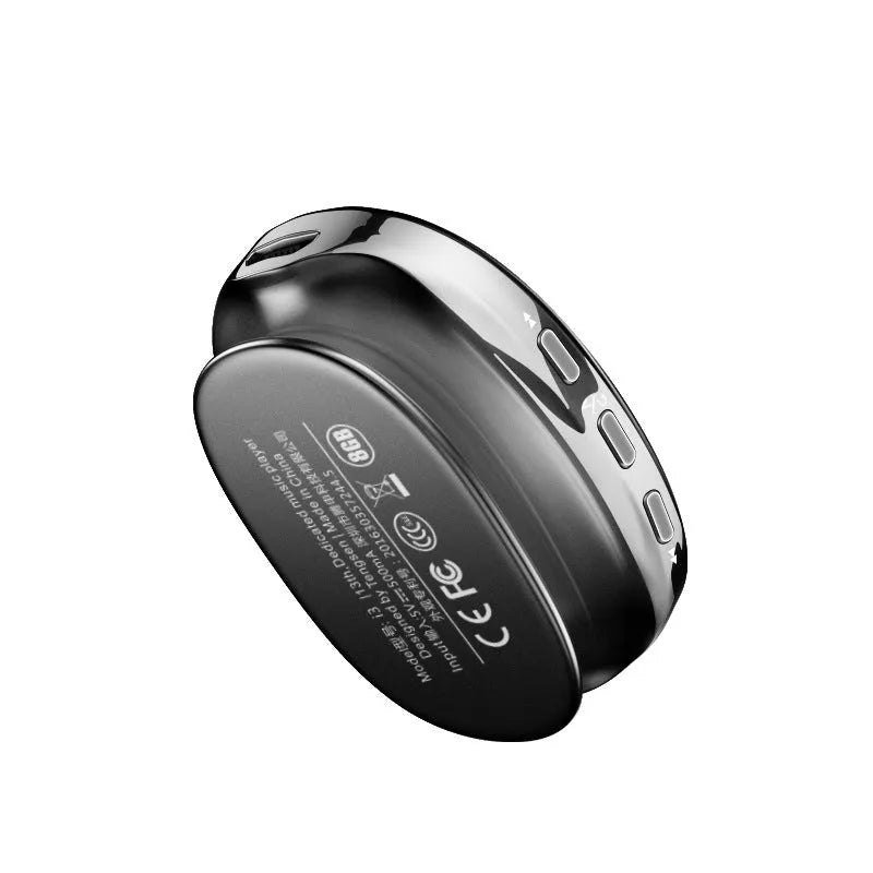 Black Bluetooth MP4 music player with OLED screen showing track information.