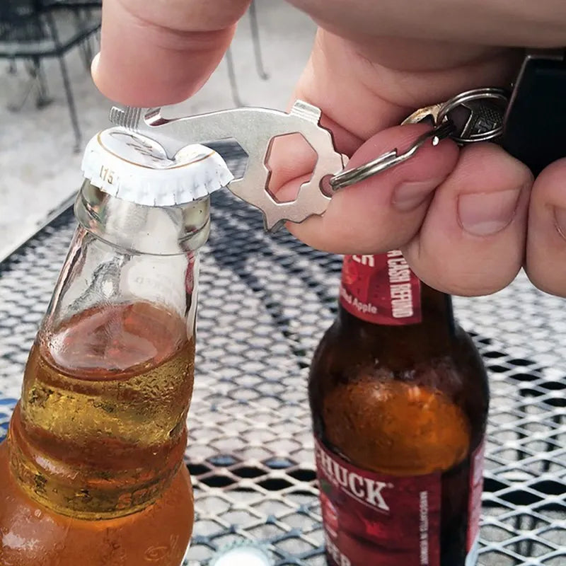 Silver 20-in-1 stainless steel multi tool keyring with screwdrivers, wrench, and bottle opener