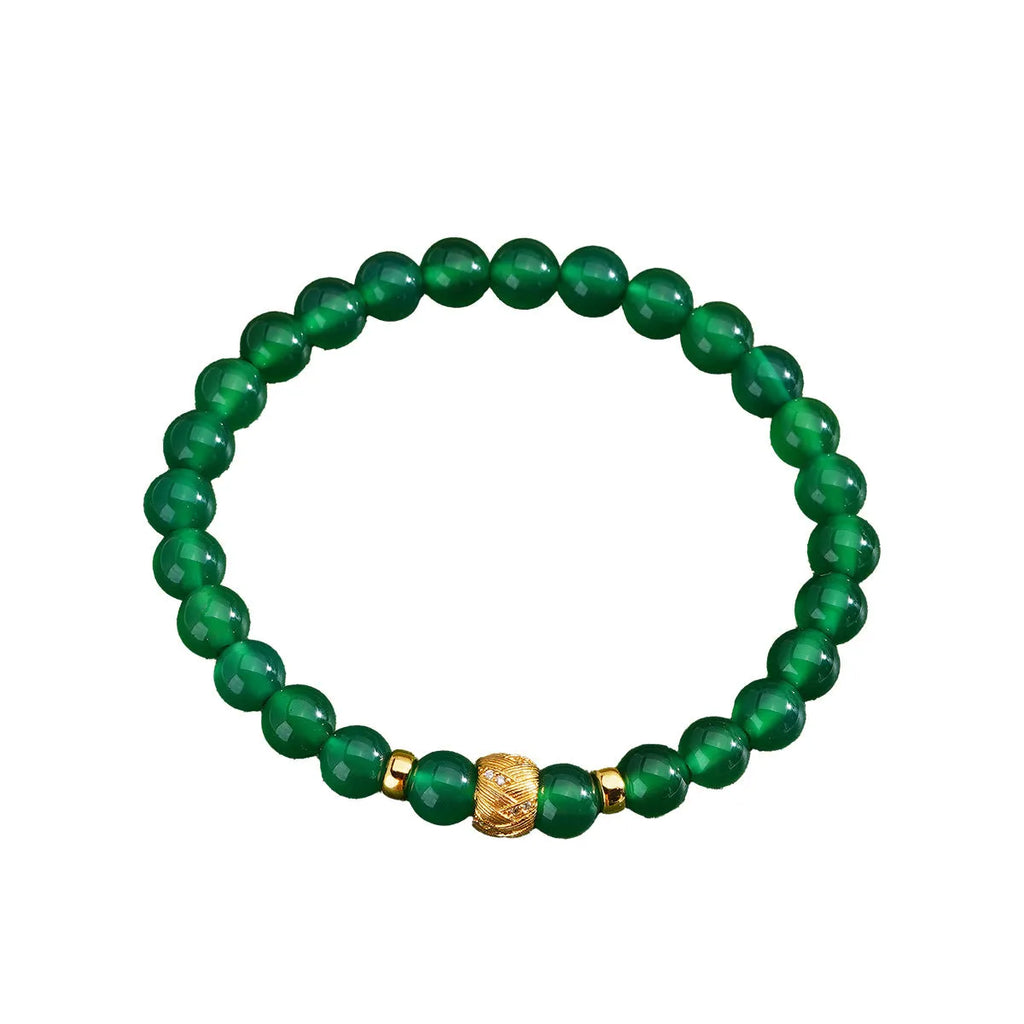 Green agate and sterling silver bracelet with yellow gold plating and 6mm geometry beads.