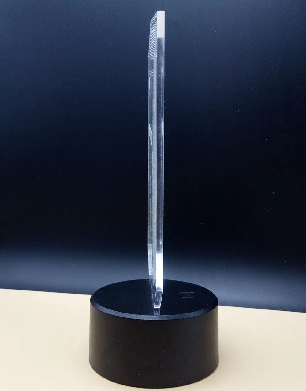 3D rose flower design night light with colour-changing LEDs on a black ABS base.