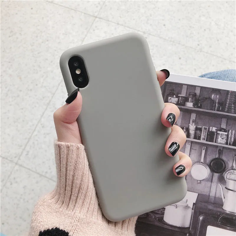 Silicone iPhone case shown in multiple colours including wine red, begonia, and black.