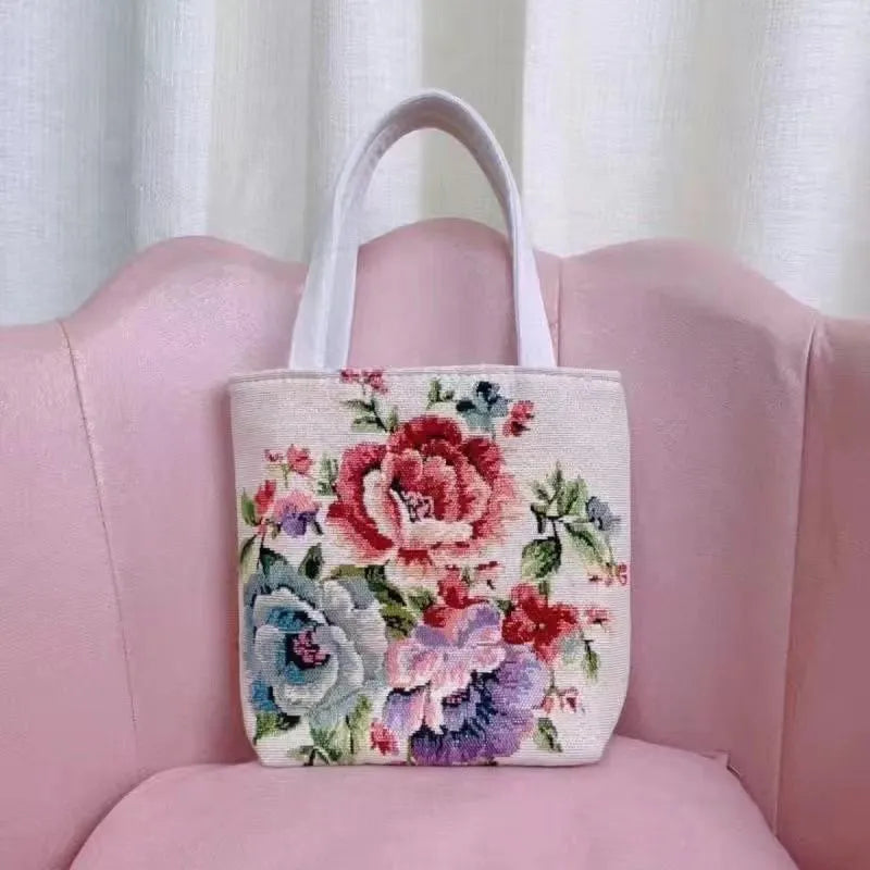 Double-sided gold wire embroidered canvas handbag in small, medium, and large sizes with patterned options.