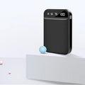Compact mini power bank in black, showing multi-USB ports and slim 93mm x 63mm x 22mm dimensions.