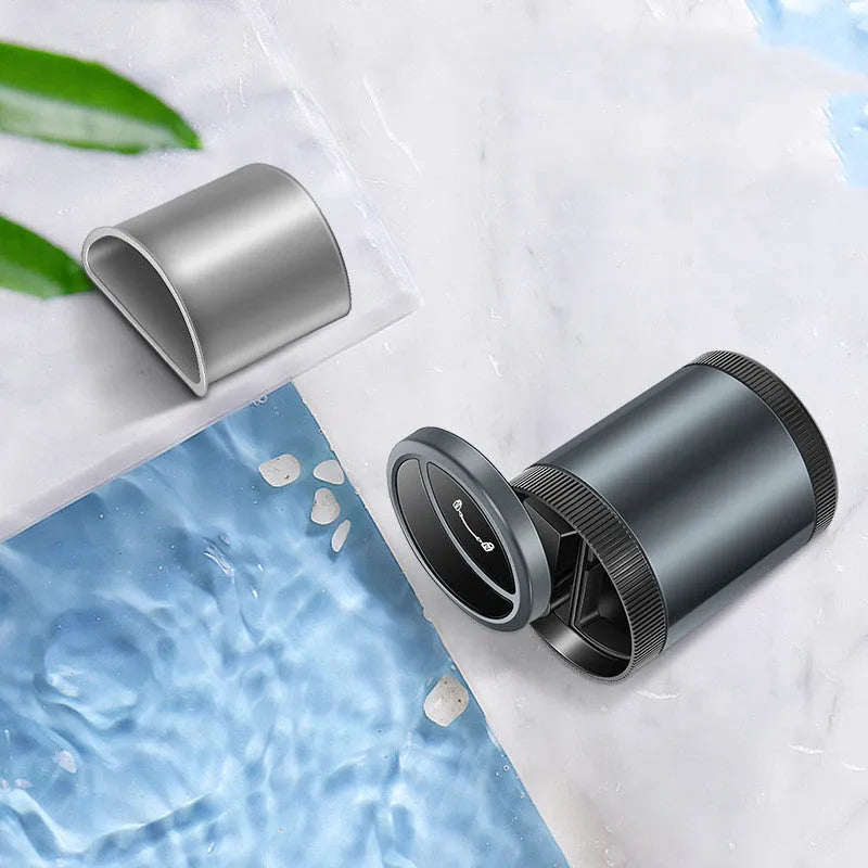 Automatic induction ashtray in black with USB cable, suitable for car, home, or office.