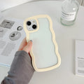 Light yellow wave border TPU phone case for iPhone 16 series, showing rear camera cutout and solid colour finish.