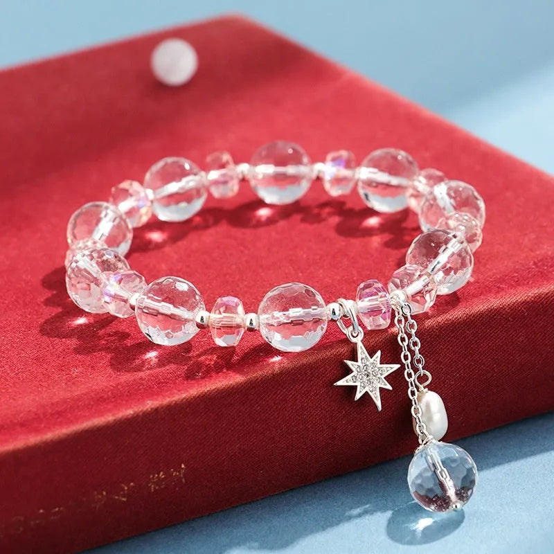 White crystal bracelet with lucky cat charm and diamond-shaped XINGX crystal centrepiece