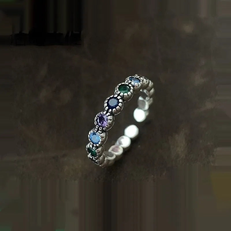 Adjustable opening women's ring with geometric round shape and zircon detailing in retro silver finish