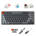 Plastic edge 87-key mechanical keyboard with white LED backlighting, grey colour, showing keycaps and USB cable