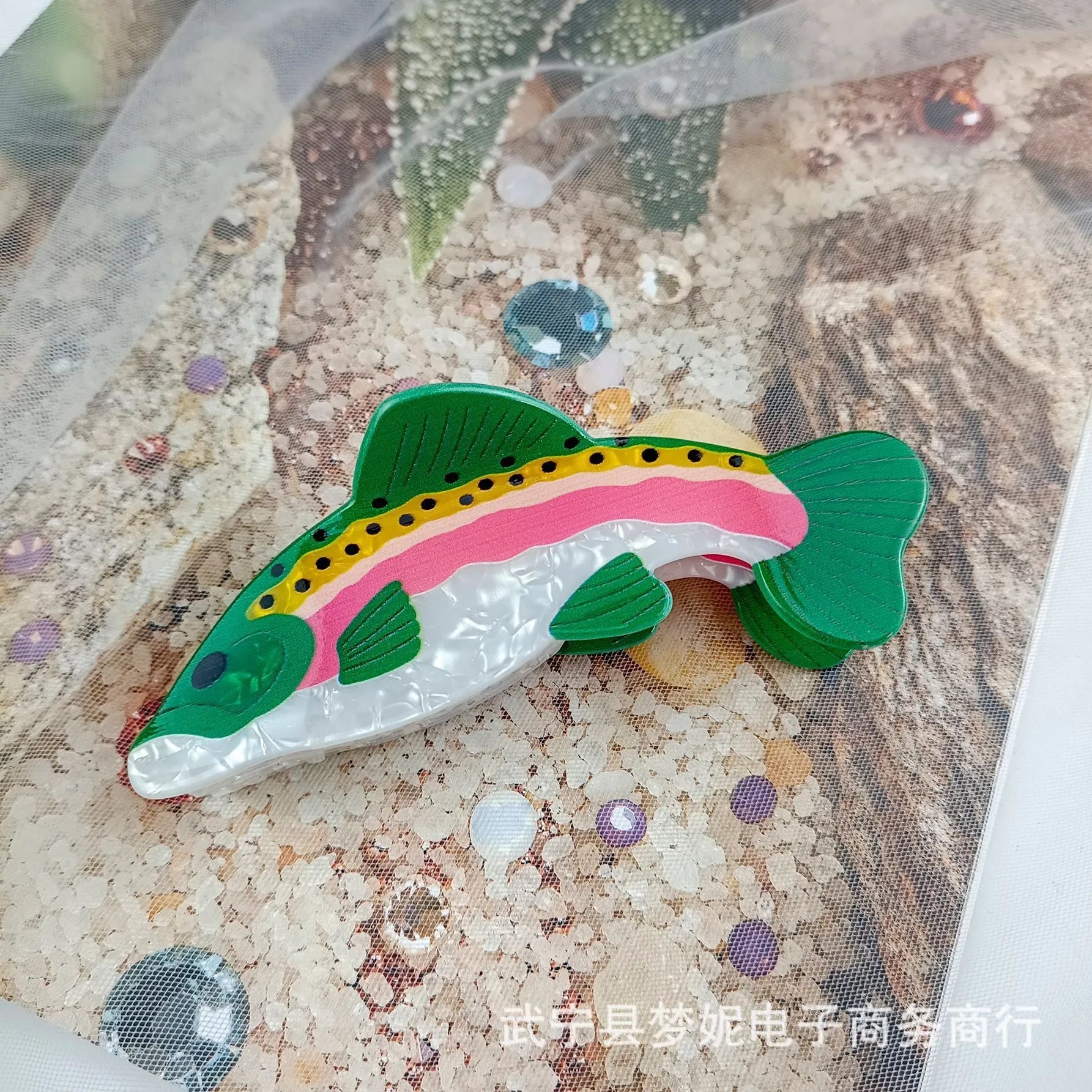 Dark green PVC hair clip with rainbow trout fish design inspired by carp elements