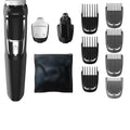 Multifunctional nose and beard hair trimmer with cleaning brush on a white background.