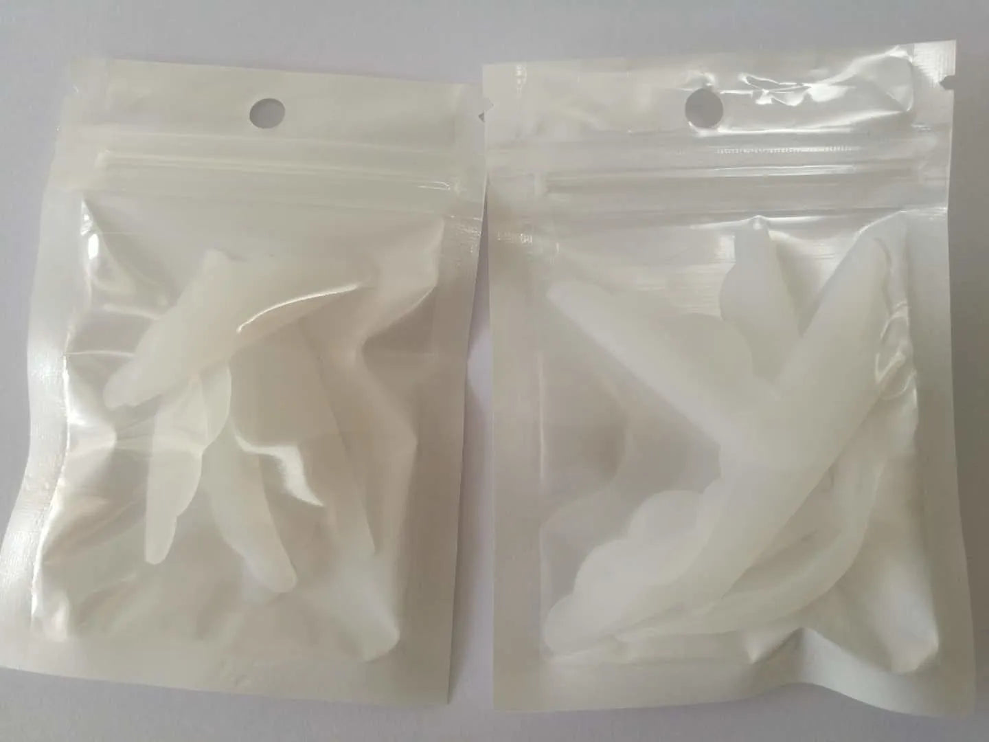 Yuemeixuan silicone eye lash shields pads in green and transparent colours for eyelash extension protection