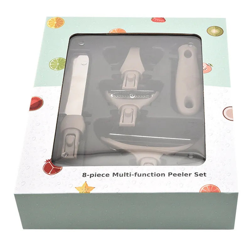 Green eight-piece multi-function kitchen planer set with transparent cover showing stainless steel blades