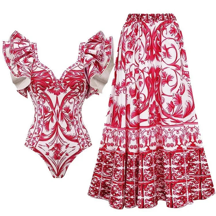 Women's printed one-piece swimsuit in blue, rose pink, white, or red colours.